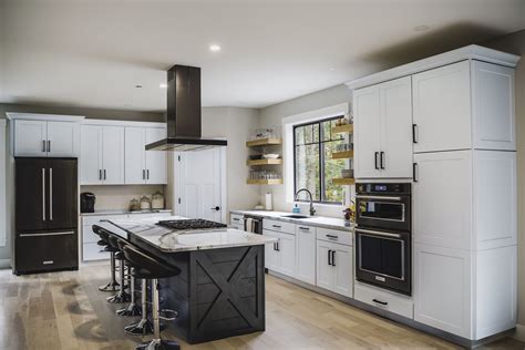 white cabinets black stainless steel appliances|black fridge in white kitchen.